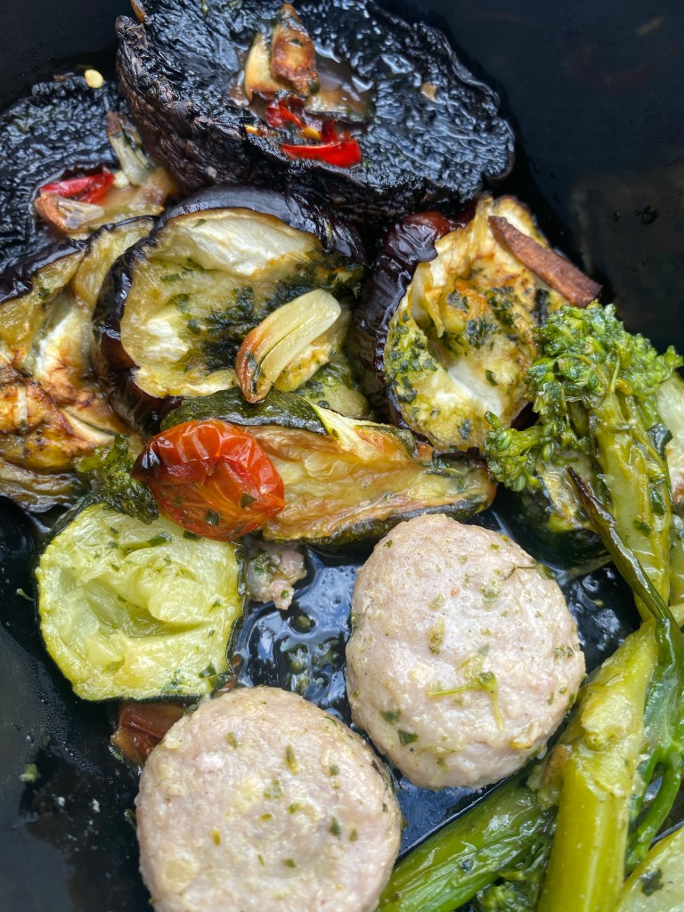 deli 'salad' containing pork balls, broccoli and roasted vegetables